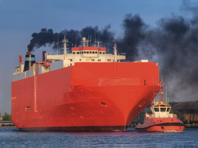 Cargo ship and exhaust gases from the ship's vent