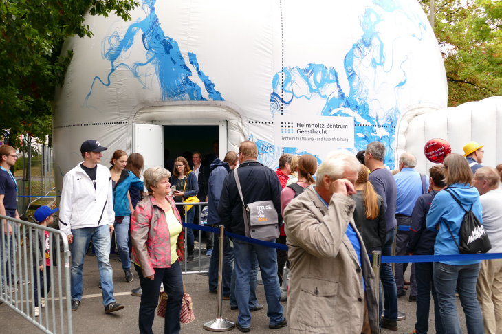 Visitors in front of the 360 degree dome