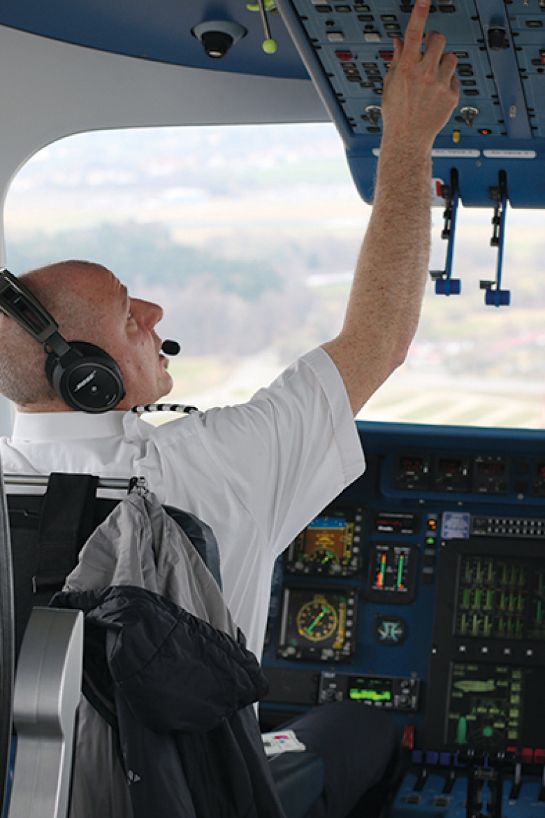 The pilot in the cockpit